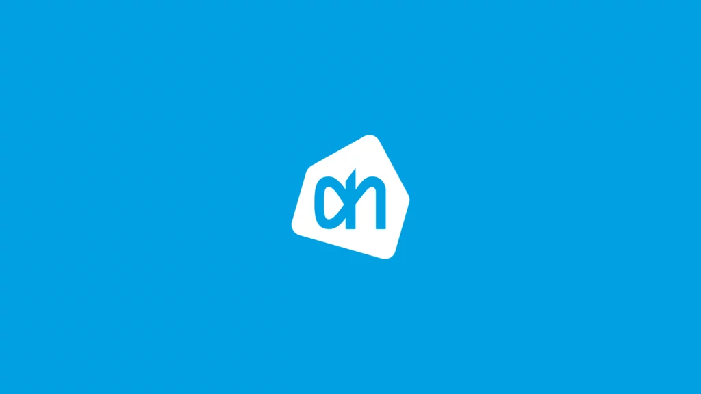 Blauwe achtergrond met een wit logo van Albert Heijn
